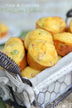 mini corn muffins in a basket on a table