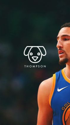 the basketball player is wearing a blue uniform with a dog on it's chest