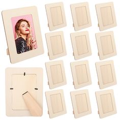 a set of twelve wooden photo frames next to each other with the same image on them