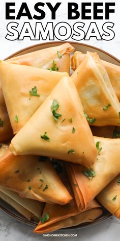 easy beef samosaas with parsley on top in a brown bowl and text overlay