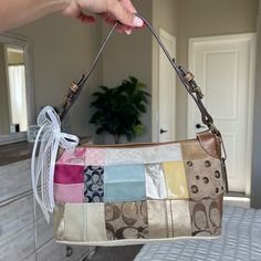 Adorable Signature Coach Patchwork Shoulder Purse! Has Blues, Pinks, Some Metallic Details, Yellows And White. Strap Is A Beautiful Light Brown Leather. This Purse Is Preowned And Has Signs Of Wear Throughout. Please See All Photos. Inside Of Bag Is Very Clean. Unbranded White Bows Included! Coach Patchwork Bag, Coach Multicolor Shoulder Bag, Vintage Pink Coach Purse, Multicolor Coach Bag With Zipper Closure, Vintage Coach Patchwork Bag, Multicolor Coach Shoulder Bag For On-the-go, Thrift Wishlist, Holiday List, Light Brown Leather