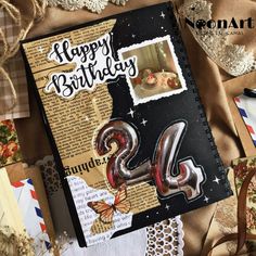 a happy birthday card with the number twenty six on it, surrounded by envelopes and papers