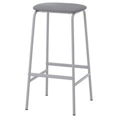 the stool is made from metal and has a grey seat pad on it, with a white frame