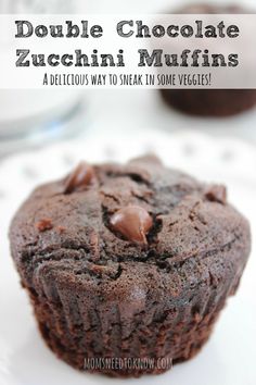 double chocolate zucchini muffins on a white plate with text overlay