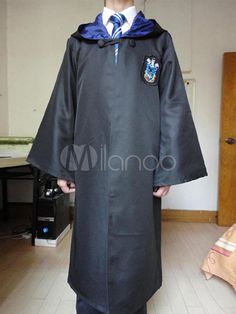 a young man in a harry potter robe