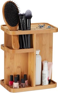 Store New Arrivals Feedback Contact   Relaxdays Bamboo Makeup Organiser, 360° Cosmetic Organiser for Bathroom & Vanity Table, HWD 31X25.5X18 Cm, Natural     Neat and tidy: wooden organiser for orderly storage of cosmetic items and jewellery Revolving: 360° rotation allows for easy access from all sides Storage solution: 7 small compartments, a large one and 3 slots for brushes, mascara, lipstick etc. Naturally lovely: Natural bamboo organiser for a better overview in your bathroom Practical: compartments in varying sizes for perfume, deodorant, etc. - HxWxD: app. 31 x 25.5 x 18 cm From the manufacturer Home, Garden and Lifestyle Relaxdays is an e-commerce company with a focus on household goods German Brand European Standards Customers First 10+ Years Experience Bamboo Makeup Organiser Thi Cosmetic Organiser, Bamboo Makeup, Tidy Bathroom, Wooden Organizer, Beauty Organization, Make Up Organiser, Cosmetic Organizer, Vanity Table, Neat And Tidy