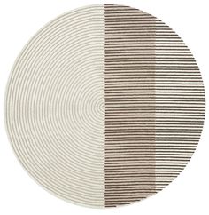 a round rug with two different stripes on it