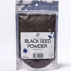 a bag of black seed powder on a white background