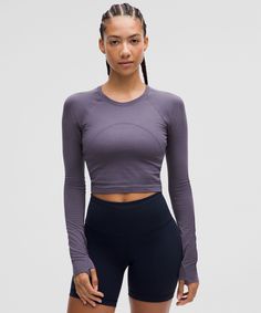 Swiftly Tech Cropped Long-Sleeve Shirt 2.0 | Women's Long Sleeve Shirts | lululemon Lululemon Long Sleeve Swiftly Tech, Lululemon Long Sleeve Breathable Top, Versatile Lululemon Tops, Versatile Solid Color Lululemon Tops, Black Moisture-wicking Top By Lululemon, Lululemon Athleisure Top With Light Support, Fitted Lululemon Tops With Light Support, Lululemon Fitted Top With Light Support, Lululemon Compressive Crew Neck Activewear