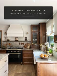 a kitchen with wooden cabinets and marble counter tops