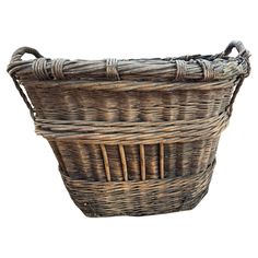 an empty wicker basket on a white background