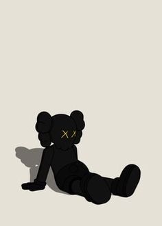 a black teddy bear sitting on the ground with its head turned to the side and eyes closed