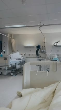 a hospital room filled with lots of medical equipment