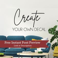 a living room with blue couches and a large wall decal that says create your own decal