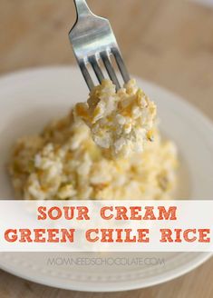 a fork with some food on it and the words sour cream green chile rice above it