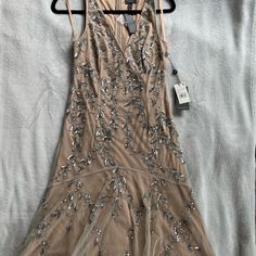 Silver Nude Short Bead Dress Brand New With Tags Size 2 Holiday Sleeveless Embellished Midi Dress, Spring Evening Beaded Dresses, Beaded Sequin Dress For Evening In Spring, Sleeveless Beaded Dress For Holidays, Holiday Sleeveless Beaded Dress, Beaded Sleeveless Dress For Holiday, Holiday Beaded Sleeveless Dress, Bead Dress, Beaded Dress Short