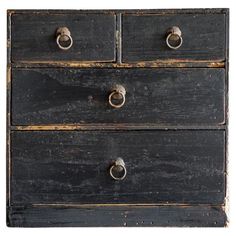 an old black dresser with two drawers and knobs on each drawer, isolated against a white background