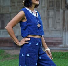 "Blue Indigo Tie Dye Sleeveless Top for Women 100% Double gauze cotton. Indigo natural dye with tie-dye detail on the side. Sizing: Made in one size to fits XS to M / US: 2/4/6/8 Measurement; Chest up to 37'' Pit to pit across 19'' Length top to bottom 15\" Armhole 18'' around. **Model is a size US 6 with 33\"bust 36\" hip. 164 cm tall.** Description: 100% Double Gauze cotton. Very soft and comfy. Indigo natural dye. With tie-dye detail on the sides. Simple round neck with a small slid in the mi Sleeveless Cotton Tops With Natural Dye, Sleeveless Cotton Top With Natural Dye, Blue Cotton Tank Top For Summer, Indigo Sleeveless Top For Spring, Washed Blue Cotton Sleeveless Tank Top, Sleeveless Washed Blue Cotton Tank Top, Sleeveless Indigo Tops For Spring, Casual Sleeveless Top With Natural Dye, Casual Sleeveless Eco-friendly Top