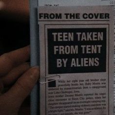 someone holding up a newspaper with an ad on it that reads, from the cover teen taken from tent by aliens