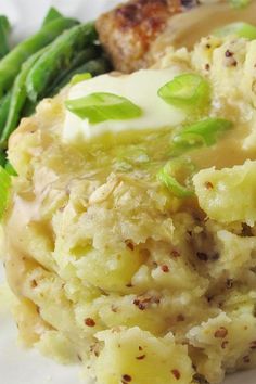 a close up of food on a plate with broccoli