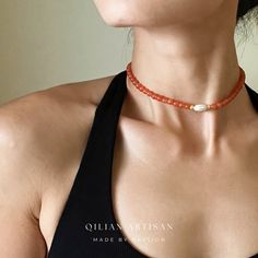 *Handcrafted: Each piece is meticulously handmade, ensuring a personal touch in every necklace. *Natural Stones: Utilizes genuine Red Agate, promising natural beauty and uniqueness. The Red Agate's gentle blaze of red and orange hues offers a feeling of warmth and softness, deeply cherished for its rich tones. *Size: Features a 14-inch choker length with a 5cm extension chain for adjustable fitting. *Designer Piece: Exclusively designed by me, showcasing a blend of creativity and craftsmanship. Bohemian Beaded Choker With Clavicle Chain, Adjustable Carnelian Red Necklace, Adjustable Red Carnelian Necklace, Red Dainty Necklace With Colorful Beads, Dainty Red Necklace With Colorful Beads, Bohemian Pearl Necklace With Tiny Beads For Gifts, Amber Beaded Necklaces With Colorful Beads, Red Beaded Choker Necklace For Summer, Agate Beaded Necklaces For Jewelry Making