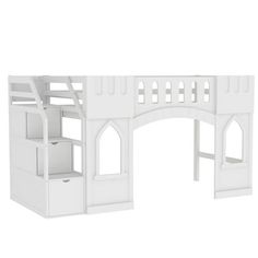 a white toy castle with stairs and storage bins