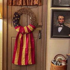 a patriotic wreath hangs on the front door of a home in washington, d c