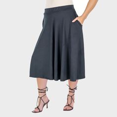 This timeless and versatile womens plus-size midi skirt is perfect for year-round wear. Designed with large pleats at the waist, a wide elastic waistband for a flattering fit, and convenient side pockets, it offers both comfort and style. Dress it down with flats for a casual, everyday look, or pair it with heels for a chic evening outfit. Crafted from a soft and stretchy polyester-spandex blend, this skirt ensures ease of movement and all-day comfort. Midi Denim, Tiered Maxi Skirt, Hem Style, Denim Midi Skirt, Evening Outfits, Skirts With Pockets, Bottom Clothes, Skirt Length, A Line Skirts