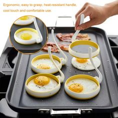 eggs are being cooked on a griddle with tongs in each one and some bacon around them