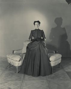 an old photo of a woman sitting in a chair with the words, the duches of maryland