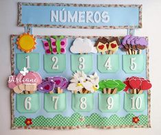 a number board with cupcakes and numbers on it