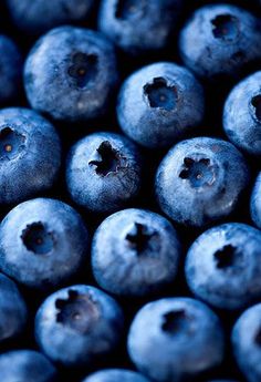 a bunch of blueberries with holes in the middle are shown on an instagram page