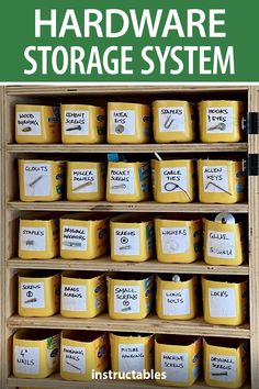 a wooden shelf filled with lots of yellow containers and labeled hardware storage system on it