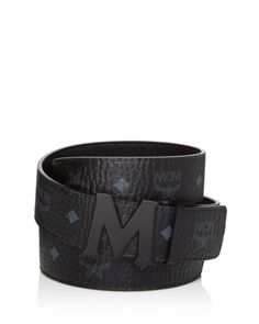 A sleek matte black M buckle and a reversible design lend signature flair to this versatile belt from Mcm. Mcm Belt, Ladies Belt, Branded Items, Mens Belt, Men Belts