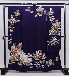 This striking silk Furisode Kimono is covered in floral.  A vintage Japanese long sleeved dress with extra long length for trailing on the ground when you walk. Wear this Kimono dress for your special event, or hang  it as a display to enjoy everyday. Item: Furisode Silk Kimono No. frn193 Size: US  M-L   /  Length 62.5 inches (159cm), Width 25.5 inch (65cm). Condition: Used, Vintage, Good. Please check the photos. Need a KIMONO RACK to hang this kimono?  Find it here: https://www.etsy.com/listin Seiden Kimono, Kimono Display, Kabuki Costume, Purple Kimono, Long Kimono Dress, Furisode Kimono, Kimono Japanese, Wedding Kimono, Long Sleeved Dress