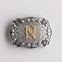 Initial Letter N Cowboy Cowgirl Western Belt Buckle BUCKLE-LE010N Brand New In Stock Only Buckle No Belt SKU:BUCKLE-LE010N Material: Zinc Alloy Heavy Metal Antique Brushed Silver Gold Double Color Length Size is, 4.09 inches, Height Size is, 3.07 inches, Weight is 4.16 oz Length Size is, 104 mm, Height Size is, 78 mm, Weight is 118 g The inner diameter for back loop is, 1.58 inches (40 mm), fits belt up to 1.58 inches (40 mm) Width Button Snap On Belts All of our buckles is fitting to all of our Initial N, Western Buckles, Western Belt Buckles, Western Belt, Letter N, Western Belts, Cowgirl Western, Cowboy Cowgirl, Cowboy And Cowgirl