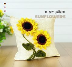 two yellow sunflowers on a white pillow with the words no sew pattern