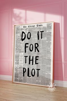 a poster with the words do it for the plot in black on a pink wall