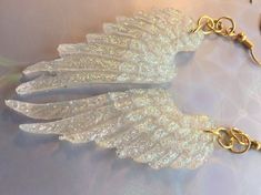 Handcrafted from resin ,mica, and glitter. These beautiful guardian angel wings can be custom colours with choice of wing base and glitter colour. Comes with gold or silver earring hooks. Gardian Angel, Guardian Angel Wings, Angel Wings Earrings, Wings Earrings, Acrylic Nail Set, Angel Wing Earrings, Crystal Angels, Beautiful Angel, Wing Earrings