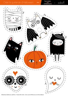 paper cut outs with halloween faces and cats