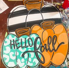 an art piece with the word hello girl painted on it