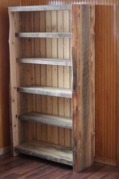 an old wooden bookcase with three shelves