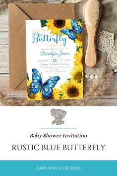 a baby shower party with sunflowers and blue butterflies on it, including a wooden spoon