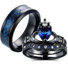 two wedding rings with blue and white diamonds on them, one has a heart shaped sapphire stone