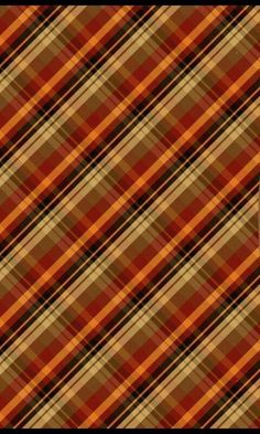 an orange and brown plaid pattern that looks like it has been made into a wallpaper