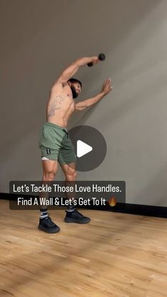 a man standing on top of a hard wood floor