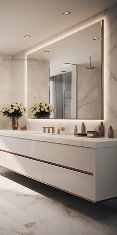 a bathroom with marble counter tops and white walls, along with two vases filled with flowers