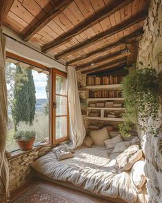 a room with a bed, window and bookshelf