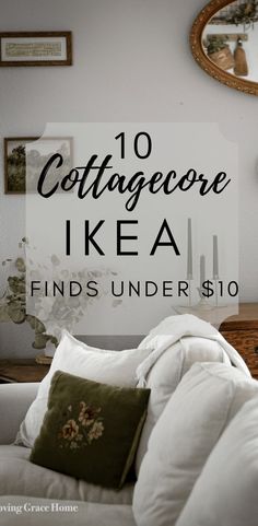 a white couch sitting under a mirror next to a table with candles on it and the words, 10 cottageore ikea finds under $ 10