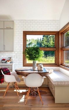 the kitchen is clean and ready to be used as a breakfast nook for two